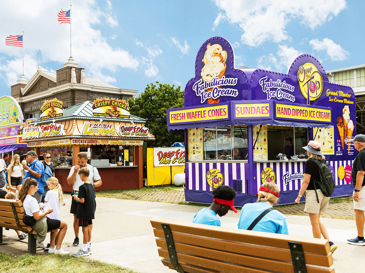 The Over The Top Ice Cream trailer at the Iowa State Fair, alongside other food trailers.
